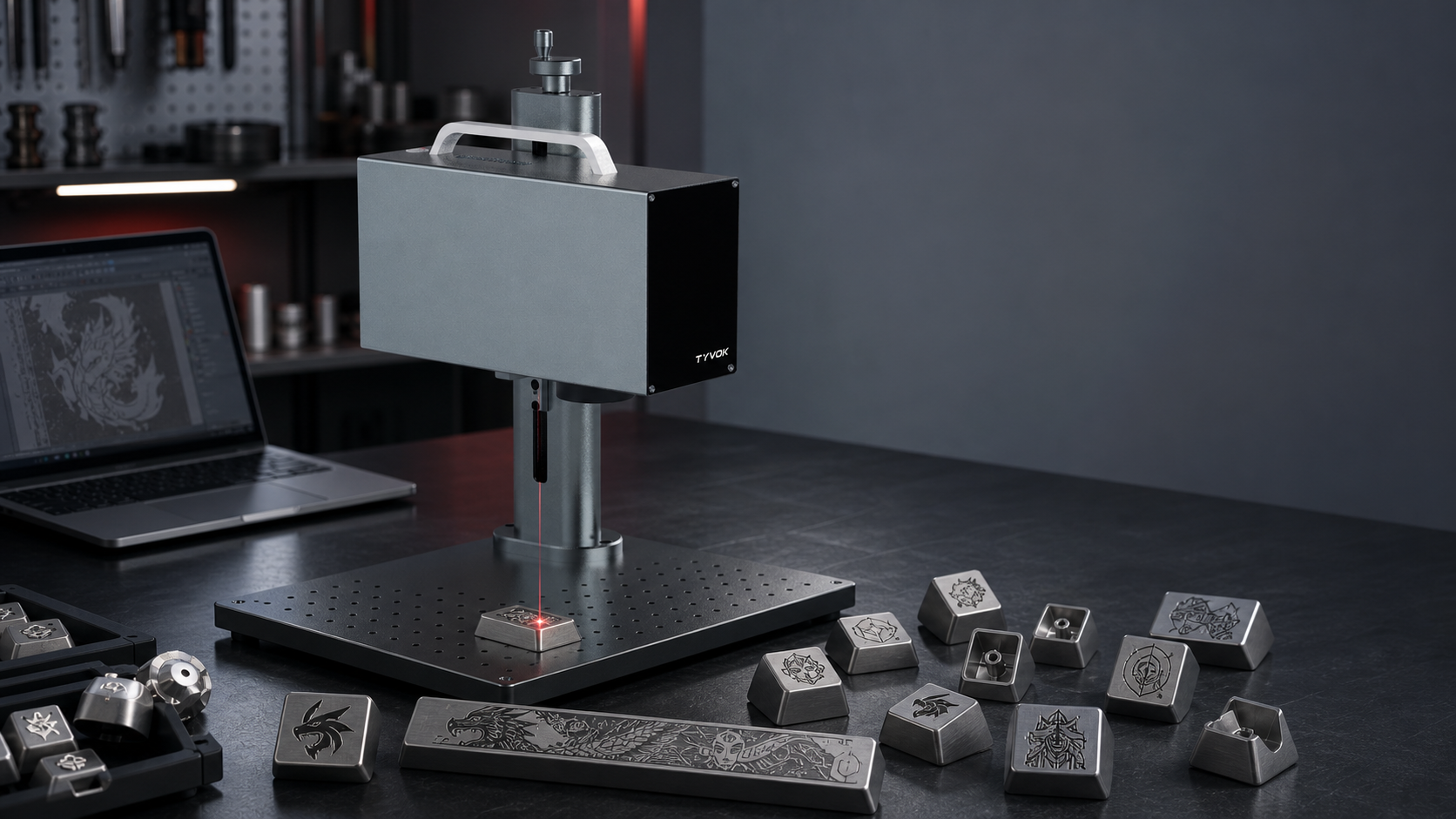 Tyvok P2 Ultra fiber laser engraver with custom metal keycaps on a production workbench